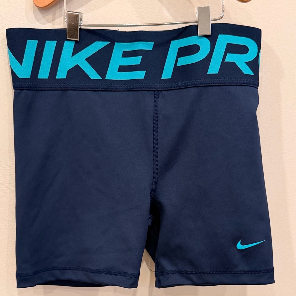 Nike Navy Shorts with Teal Logo and Waistband